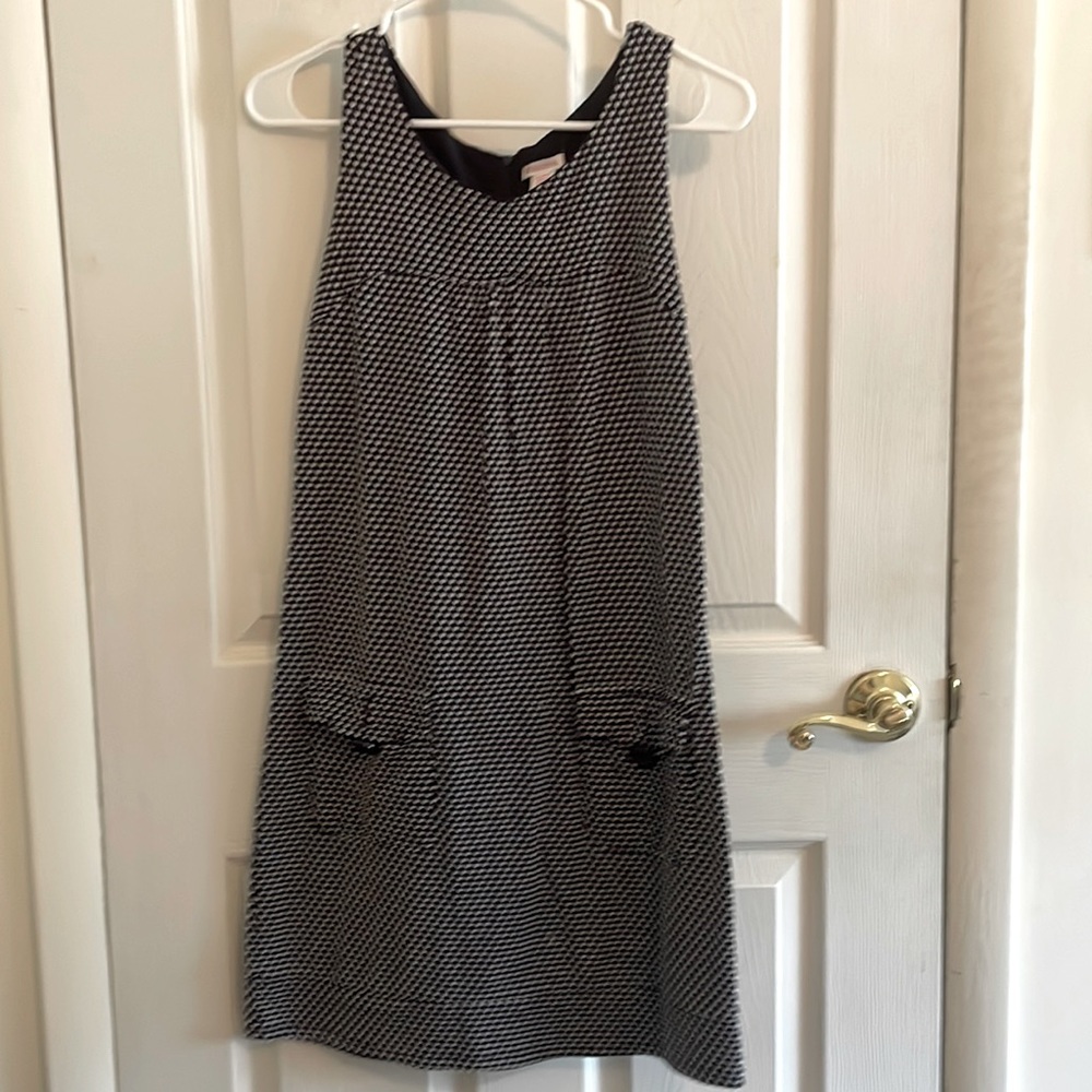 Blue jumper with white hearts and pocket detail. EUC